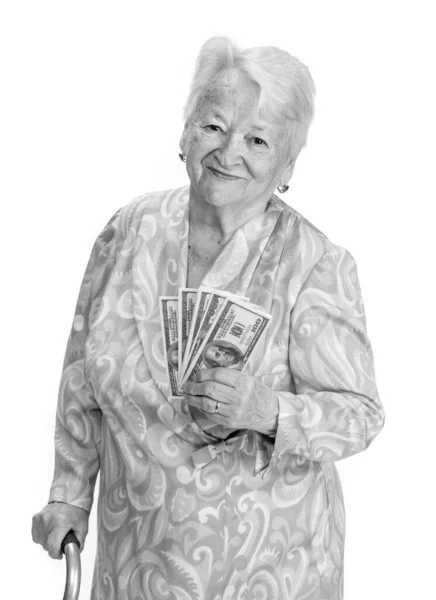 Portrait of old woman with a cane and holding money in hand — Stock Photo, Image