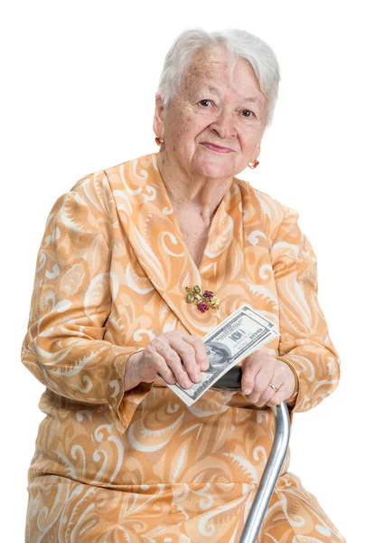 Retrato de mulher velha com uma bengala e segurando o dinheiro na mão — Fotografia de Stock