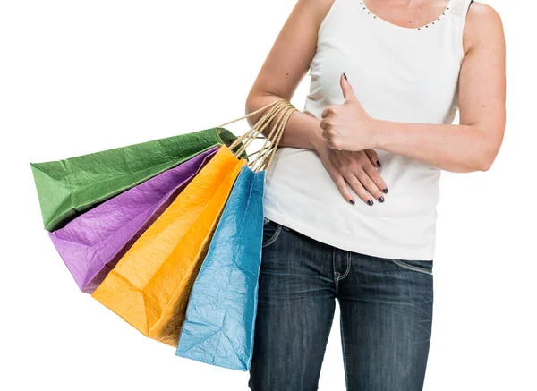 Mulher posando com sacos de compras em um fundo branco — Fotografia de Stock
