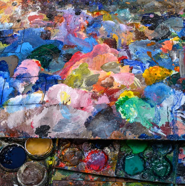 Artistic paints on palette — Stock Photo, Image