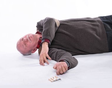 Healthcare and medicine concept. Senior man falling down from stroke or heart attack