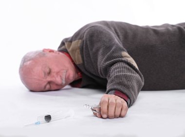 Healthcare and medicine concept. Senior man falling down from stroke or heart attack