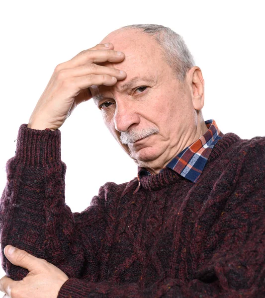 Sad lonely elderly man posing in studio on a white background — Stock Photo, Image