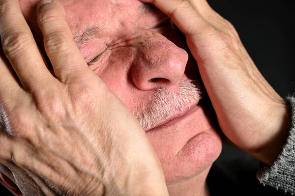 Healthcare, pain, stress and age concept. Sick old man