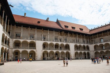 KRAKOW, POLAND - JULY 27, 2013: Beautiful architecture of old downtown in Krakow, Poland. Inside Wawel Castle courtyard