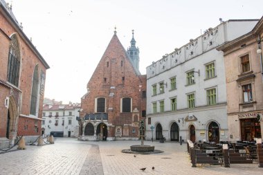 KARKOW, POLAND - JULY 27, 2013: Beautiful architecture of old Krakow in Poland. The downtown of Krakow