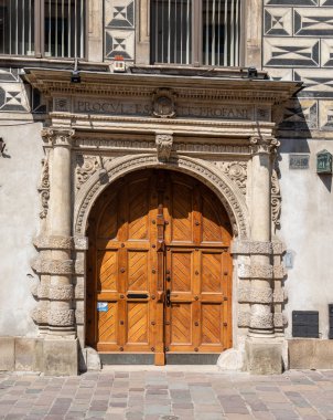 KARKOW, POLAND - JULY 27, 2013: Old wooden entrance door in Krakow, Poland