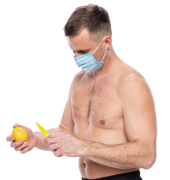 Raising Immunity Healthcare Concept Man Protective Mask Cutiing Lemon White — Stock Photo, Image