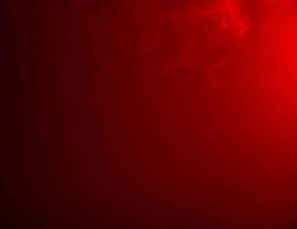黒い背景の上に赤い煙 — ストック写真
