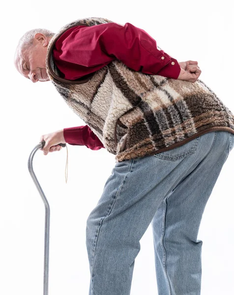 医療の概念 背中の痛みや白い背景の手綱に苦しんで杖を持つ不幸な高齢者 — ストック写真