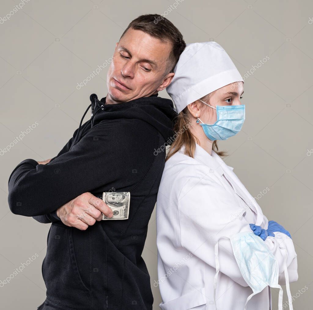 Healthcare and medical concept. Man asking a doctor to give him  medical help for money