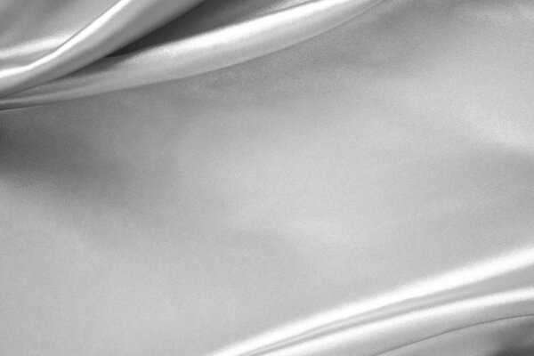 Гладкий элегантный серый шелк или атласная текстура использовать для фона.