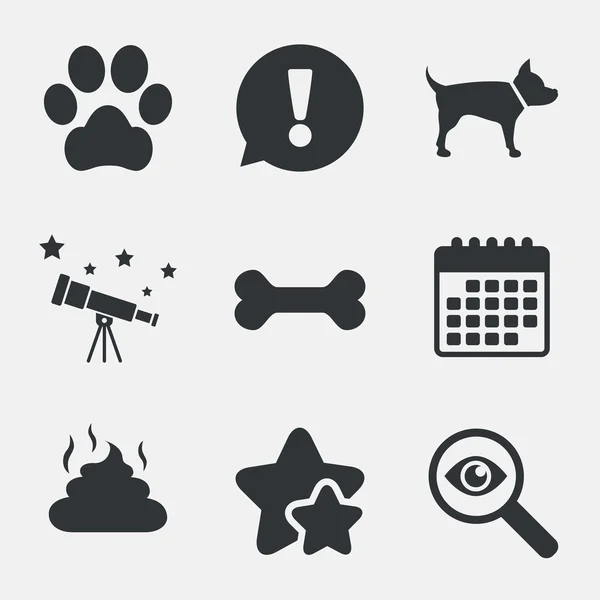 Ikony zwierzęta. oznaki łapa i kał psa. — Wektor stockowy