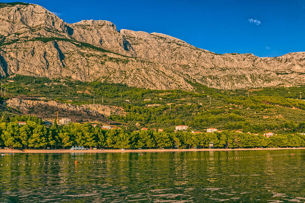 Panoramic view of the beautiful nature of Tucepi touristic town on the Adriatic Sea coast, Croatia.