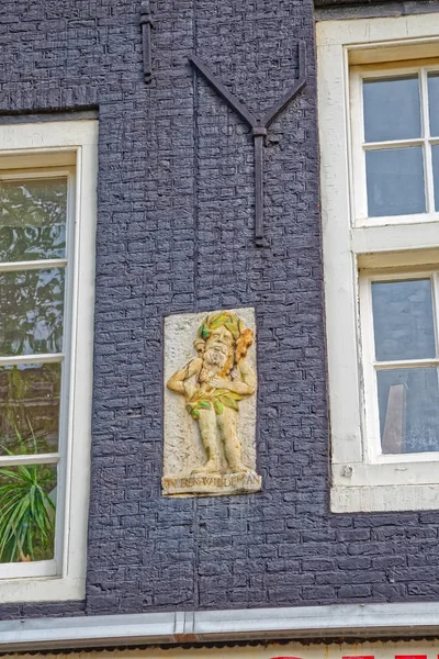 Amsterdam relieve mural de la antigua casa — Foto de Stock