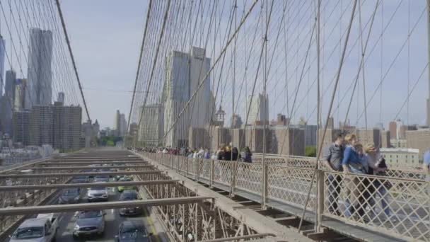 Manhattan through the Brooklyn Bridge cables in New York — Stock Video