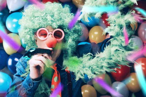 Crazy Young Party Man Having Fun Carnival Colorful Balloons Background — 스톡 사진
