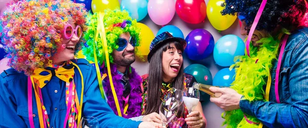Happy Young Friends Drinking Champagne Celebrating Carnival New Year Party — 스톡 사진