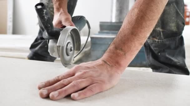 Man Cutting Tiles Handy Machine Construction Site Indoors — Stock Video