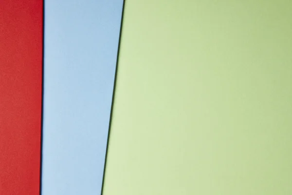 Farbige Pappen Hintergrund rot blau grün Ton. Kopierraum — Stockfoto