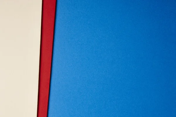 Barevné kartony pozadí béžové červené modré tóny. Kopírovat prostor — Stock fotografie