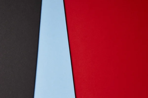 Farbige Kartons Hintergrund in schwarz blau rot Ton. Kopierraum. — Stockfoto