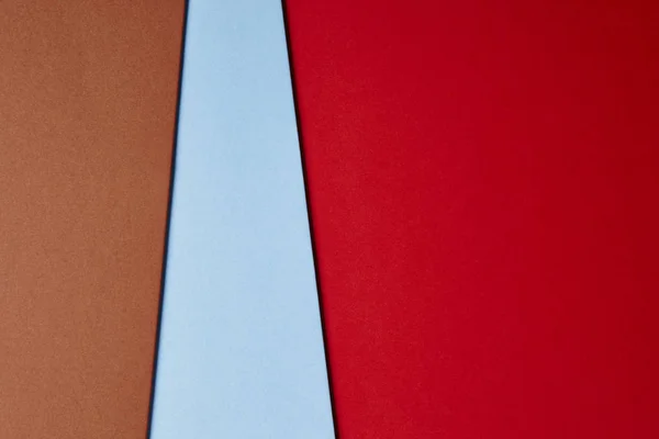 Fondo de cartulinas de color marrón en tono rojo azul. Copiar espacio —  Fotos de Stock