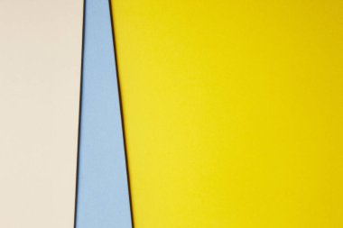 Renkli kartonlar arka plan bej mavi sarı tonda. SP kopyalama