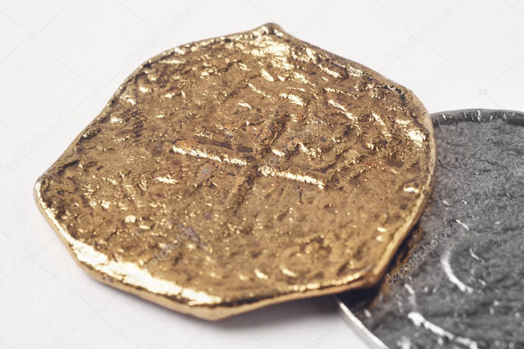 Gold silver 19th century doubloons isolated on white. 