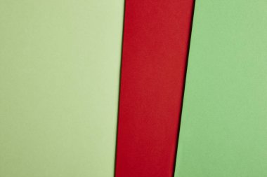 Renkli kartonlar arka planda yeşil kırmızı sesi. Kopya alanı