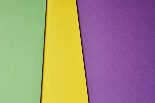 Цветной картонный фон зеленого желтого фиолетового тона. Копия — стоковое фото