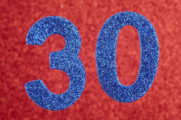 Kırmızı bir arka plan üzerinde otuz mavi renk. Yıldönümü. 
