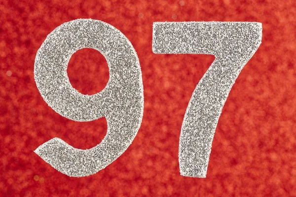 Numer biały kolor dziewięćdziesiąt siedem na czerwonym tle. Anniversa — Zdjęcie stockowe