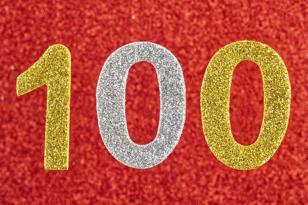 Número cien sobre un fondo rojo. Aniversario . —  Fotos de Stock