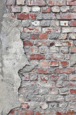 Hasarlı tuğla ve beton duvar. Grunge arka plan. Kopya alanı. 