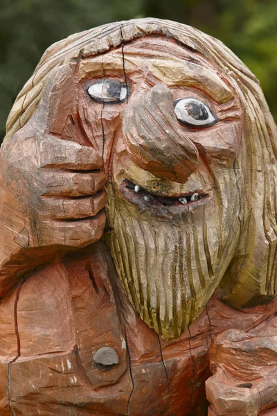 Norwegian carved wooden face detail troll. Scandinavian folklore — Stock Photo, Image