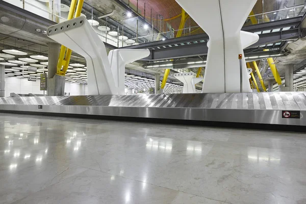 International airport baggage belt claim area. Nobody. Travel ba