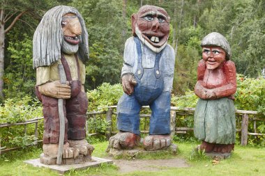 Norwegian carved wooden trolls. Scandinavian folklore. Norway.  clipart