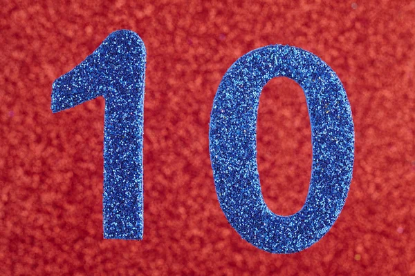 Number ten blue color over a red background. Anniversary. — Stock Photo, Image