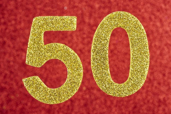 Zahl fünfzig gelb über rotem Hintergrund. Jubiläum. — Stockfoto