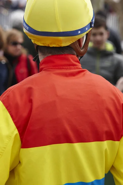 Jockey detail after the race. Hippodrome background. Racehorse. — Stock Photo, Image
