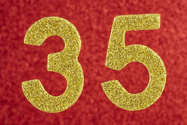 Number thirty-five yellow color over a red background. Anniversa — Stock Photo, Image