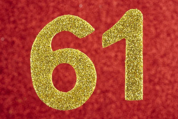 Numéro 61 couleur jaune sur fond rouge. Anniversaire — Photo