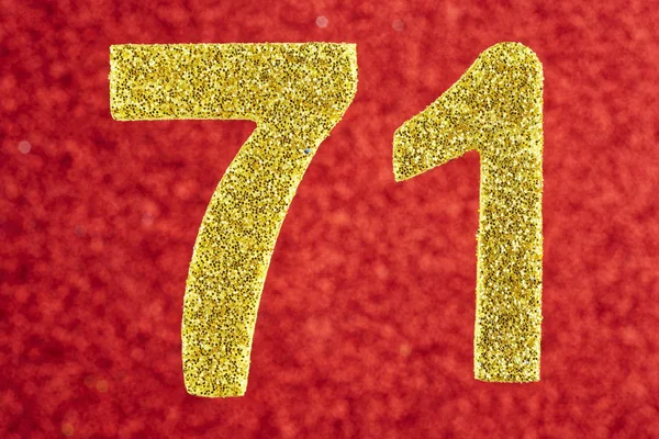 Numero 71 color oro su uno sfondo rosso. Anniversario — Foto Stock