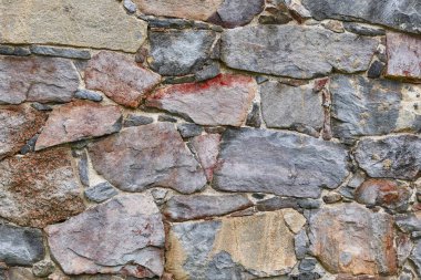 Kaba taş duvar cephe. Dokulu arka plan