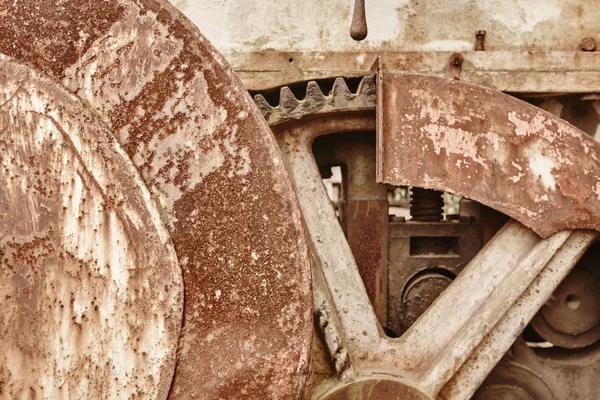 Detalle de maquinaria oxidada en tono cálido. Grunge. — Foto de Stock
