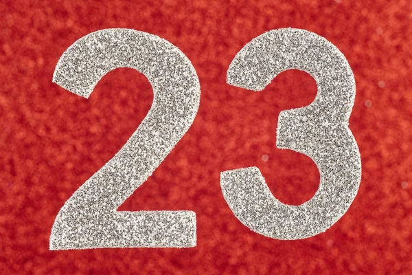 Αριθμός είκοσι τρία ασημένια πάνω σε κόκκινο φόντο. Επέτειος — Φωτογραφία Αρχείου