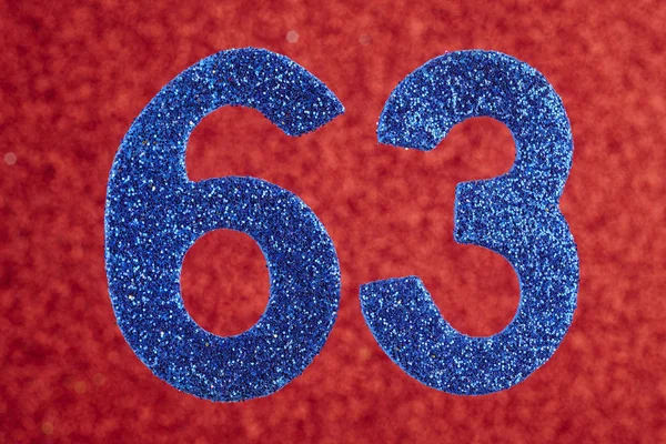 Zahl dreiundsechzig blaue Farbe auf rotem Hintergrund. Jubiläum — Stockfoto