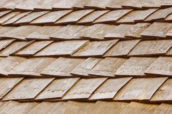 Wood shingle tiles on a roof. Finland traditional construction