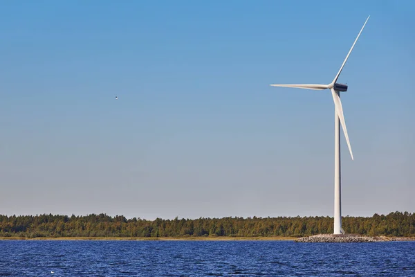Wind turbine in the baltic sea. Renewable green energy
